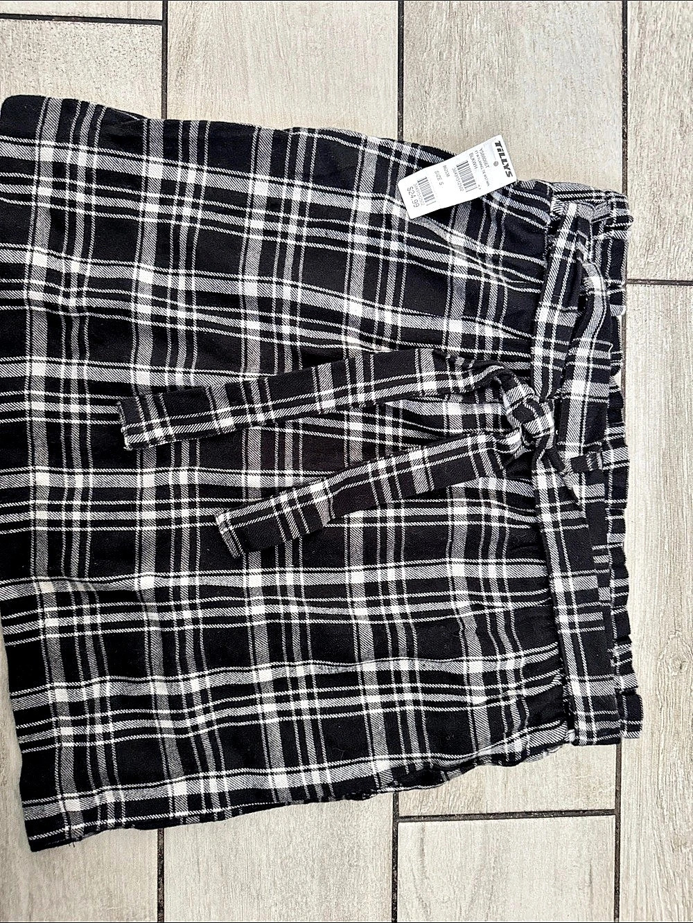 Full Tilt Flannel Tie Waist Mini Skirt Plaid Mini Skirt in Black & White Size